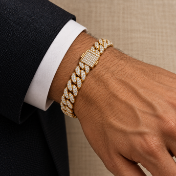 Men’s yellow gold pavé Cuban link diamond bracelet worn on the wrist — illustrative rendering