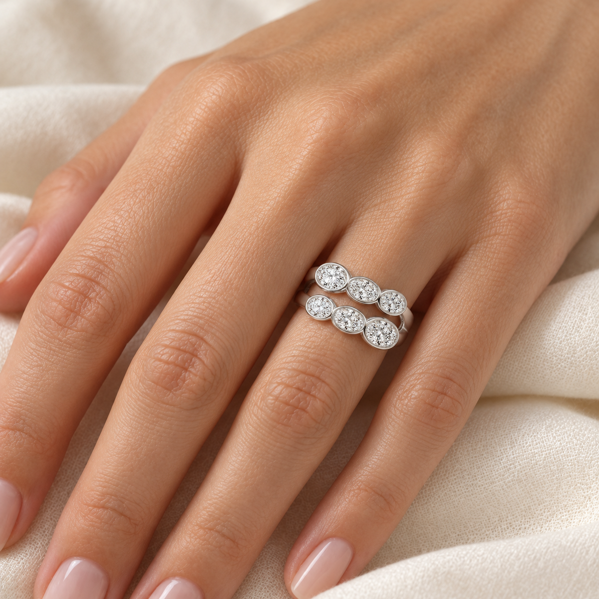 Oval Double-Row Bezel Ring in 14K white gold, on-hand styling view – illustrative rendering