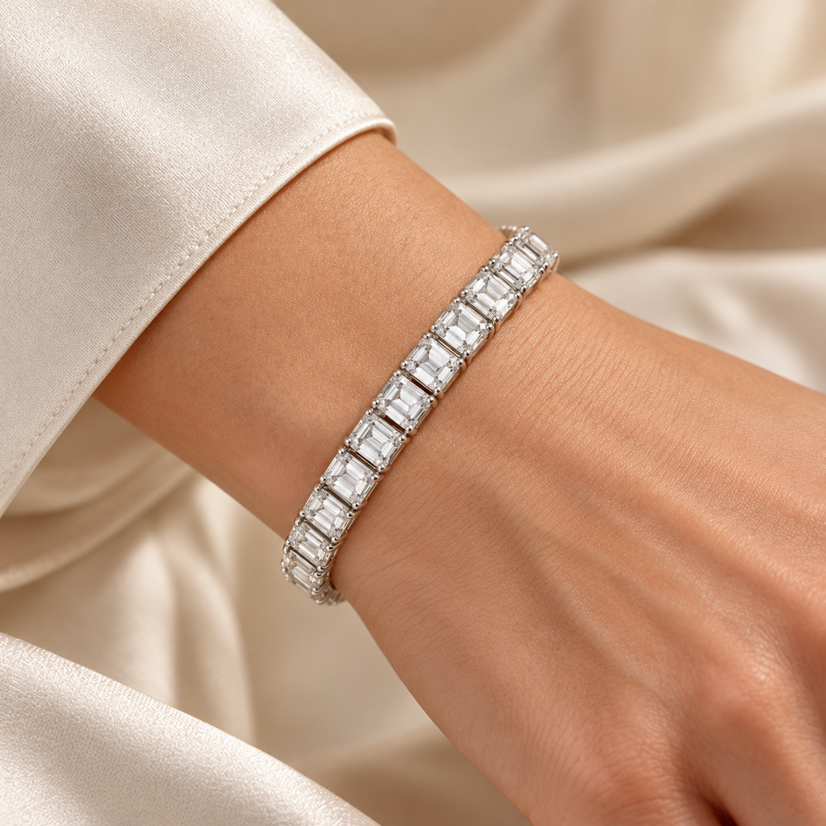 North-South Emerald Tennis lab-grown diamond bracelet, white gold wrist view — illustrative design rendering