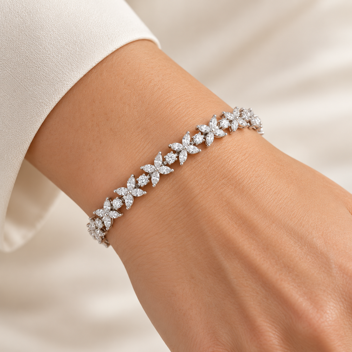 Marquise & Round Petal lab-grown diamond bracelet in 14K white gold, styled on a wrist — illustrative design rendering