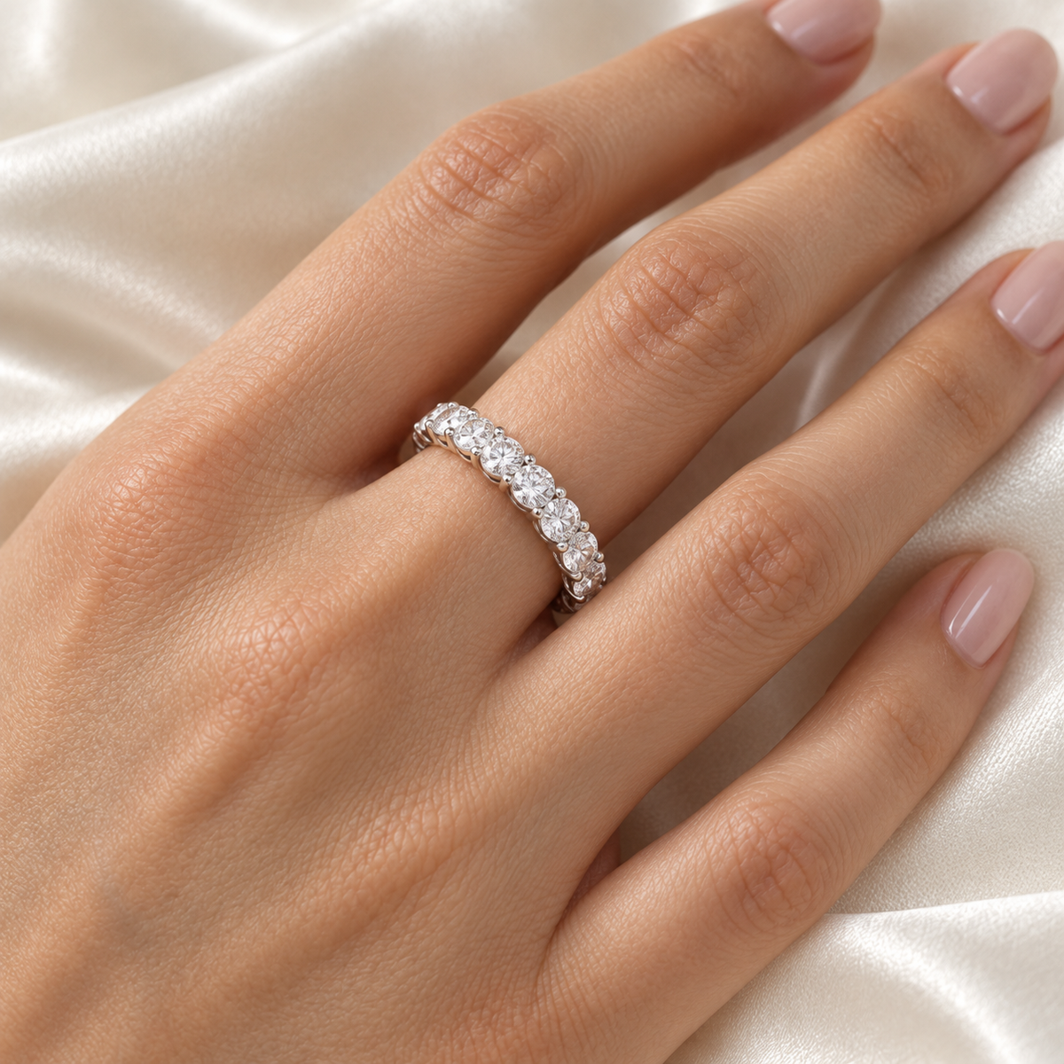 Round Three-Quarter Lab-Grown Diamond Eternity Ring — 4 CTW — 14K White Gold — on-hand view — illustrative rendering