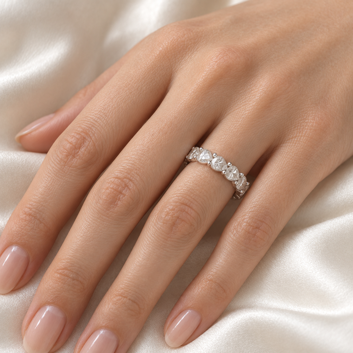 Pear Floating Lab-Grown Diamond Eternity Ring — 4 CTW — 14K White Gold — on-hand view — illustrative rendering