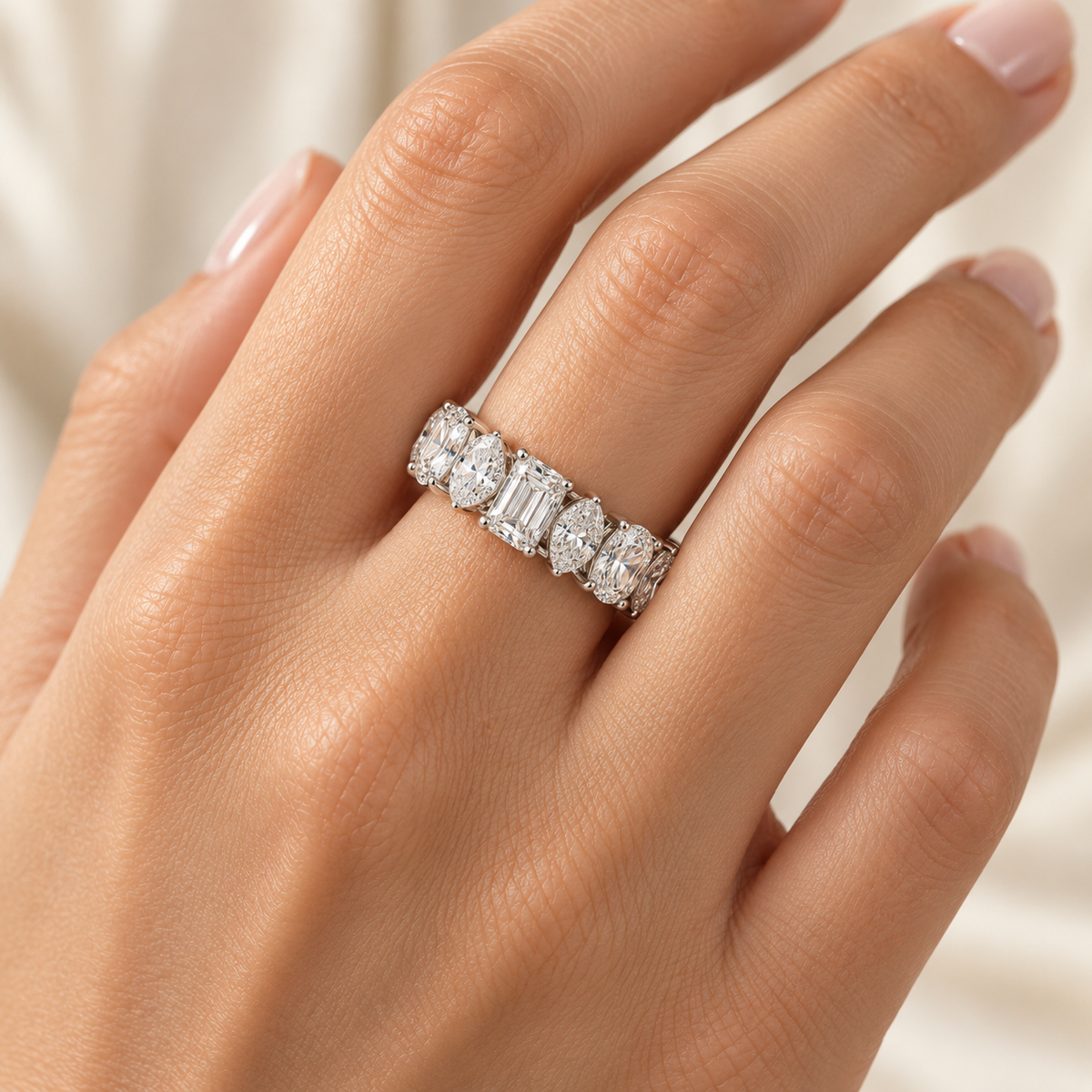 Mixed-Shape lab-grown diamond eternity ring in 14K white gold, on-hand styling view — illustrative rendering