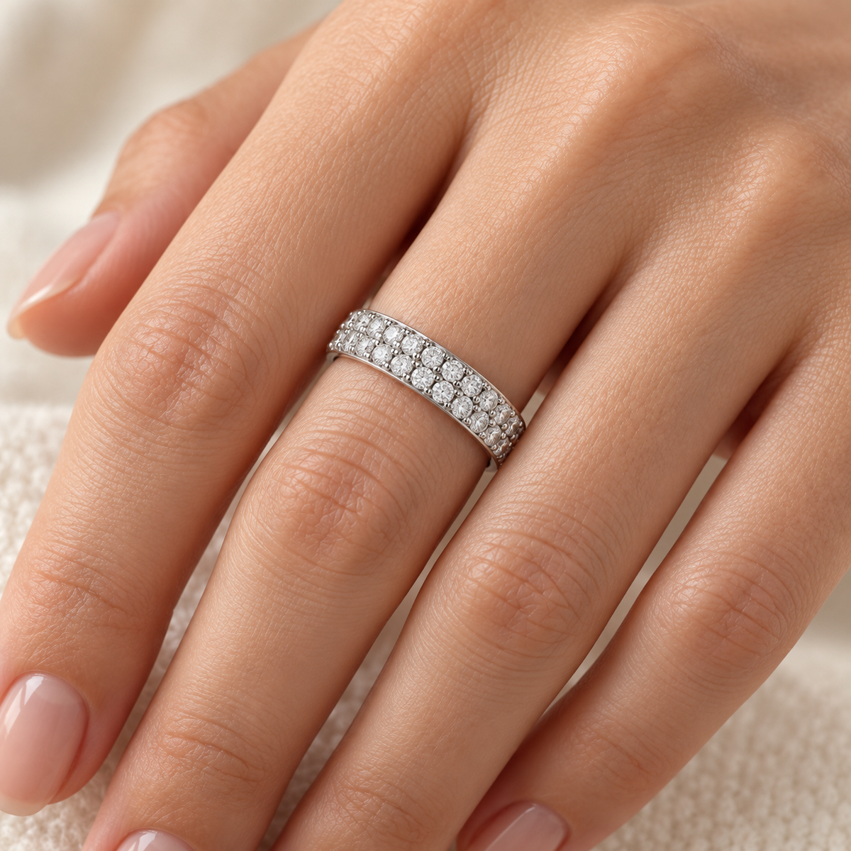 Round Double-Row lab-grown diamond eternity ring in 14K white gold, on-hand styling view — illustrative rendering