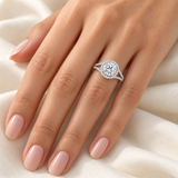 Round split-shank Halo engagement ring — worn view, white gold; illustrative design rendering