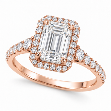 Emerald Graduated Halo in 14K rose gold — illustrative design rendering