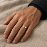 Men’s Signature 6mm Gold Wedding Band — yellow gold worn on a man's hand, illustrative rendering