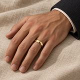Men’s Classic Dome 5mm Gold Wedding Band — yellow gold worn on a man's hand, illustrative rendering