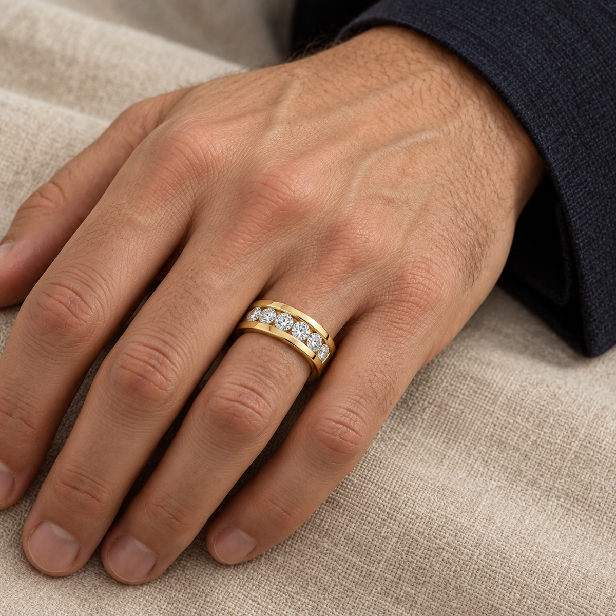 Men’s Channel Set Lab Diamond Band — 2 CTW — yellow gold worn on a man's hand, illustrative rendering