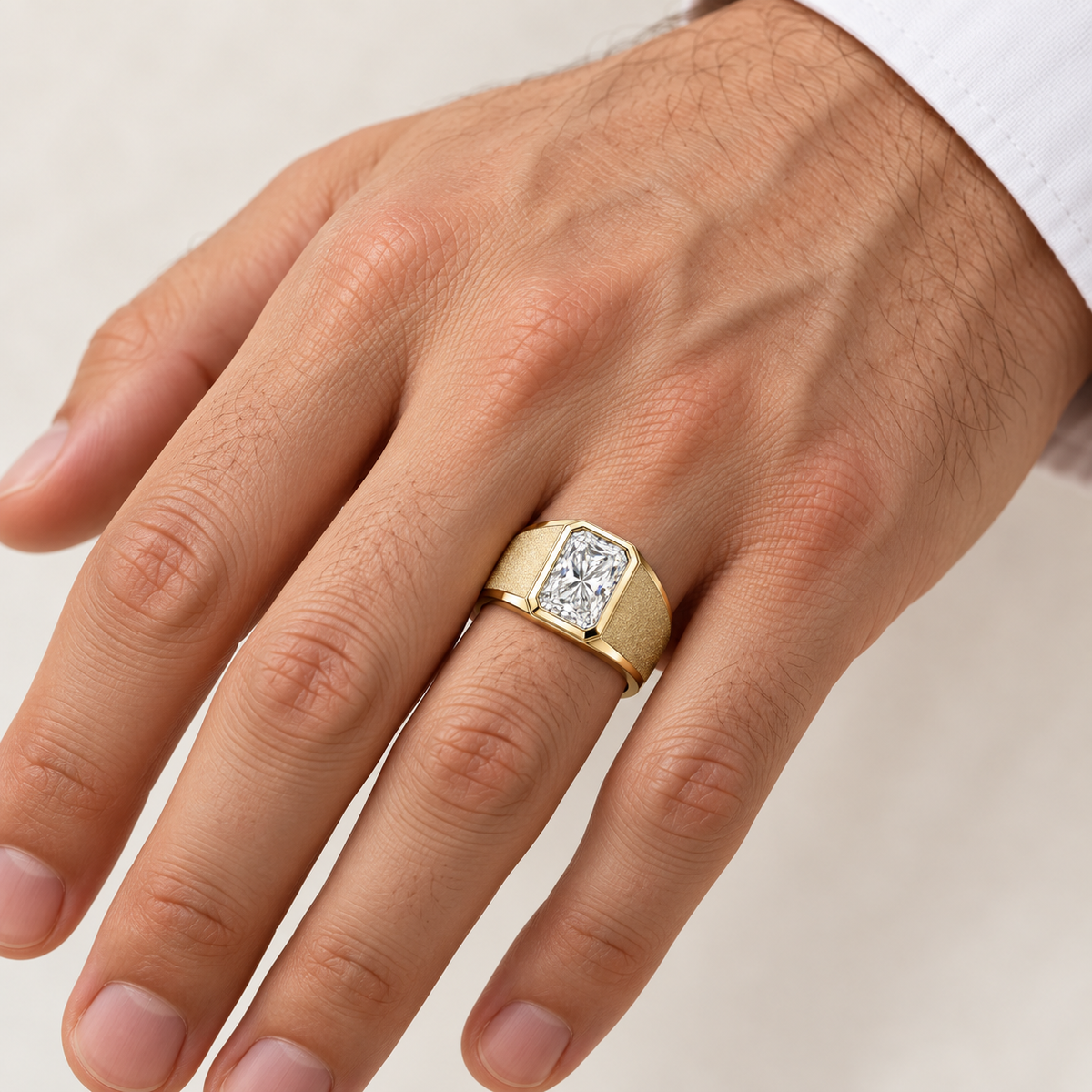 Men’s Radiant Sandblast Bezel Lab Diamond Ring — 3 CT in 14K yellow gold worn on a man's hand — AI-generated illustrative design rendering