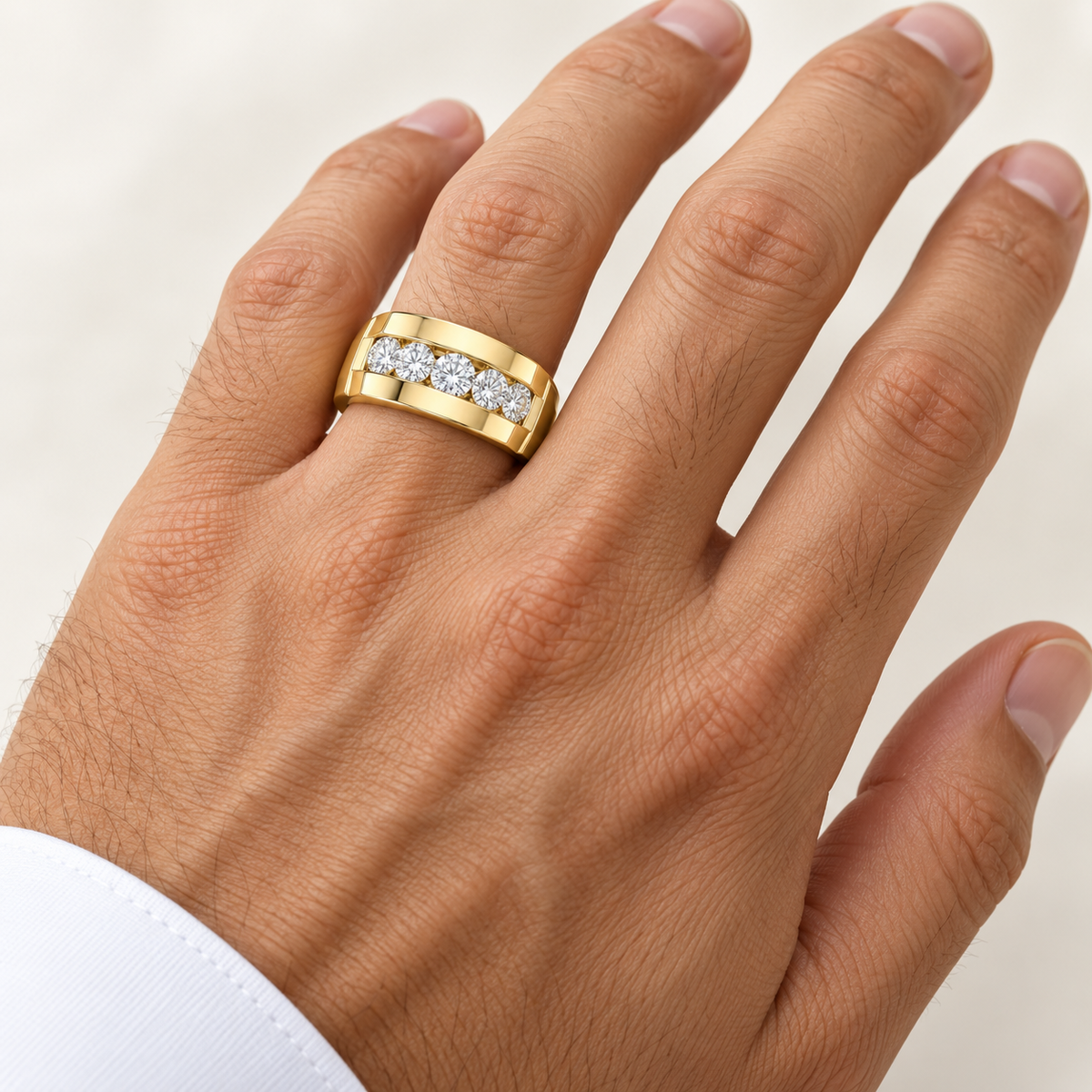 Men’s Atlas Wide Five-Stone Lab Diamond Band — 3 CTW in 14K yellow gold worn on a man's hand — AI-generated illustrative design rendering
