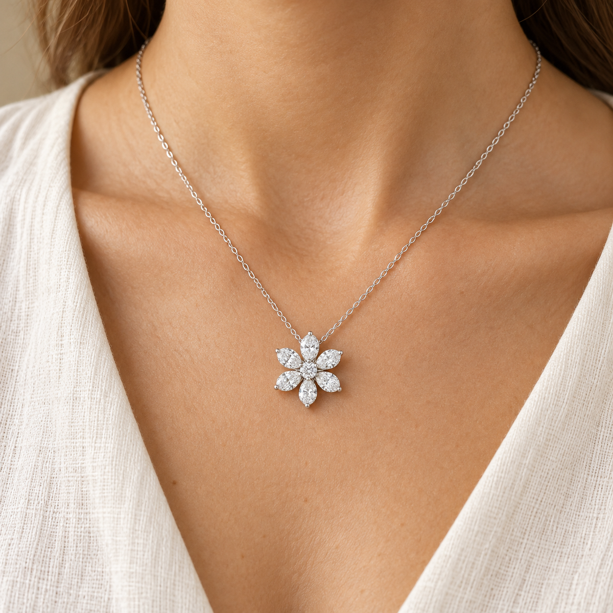 Six-Petal Diamond Flower, Pear & Round, white gold worn view — illustrative design rendering