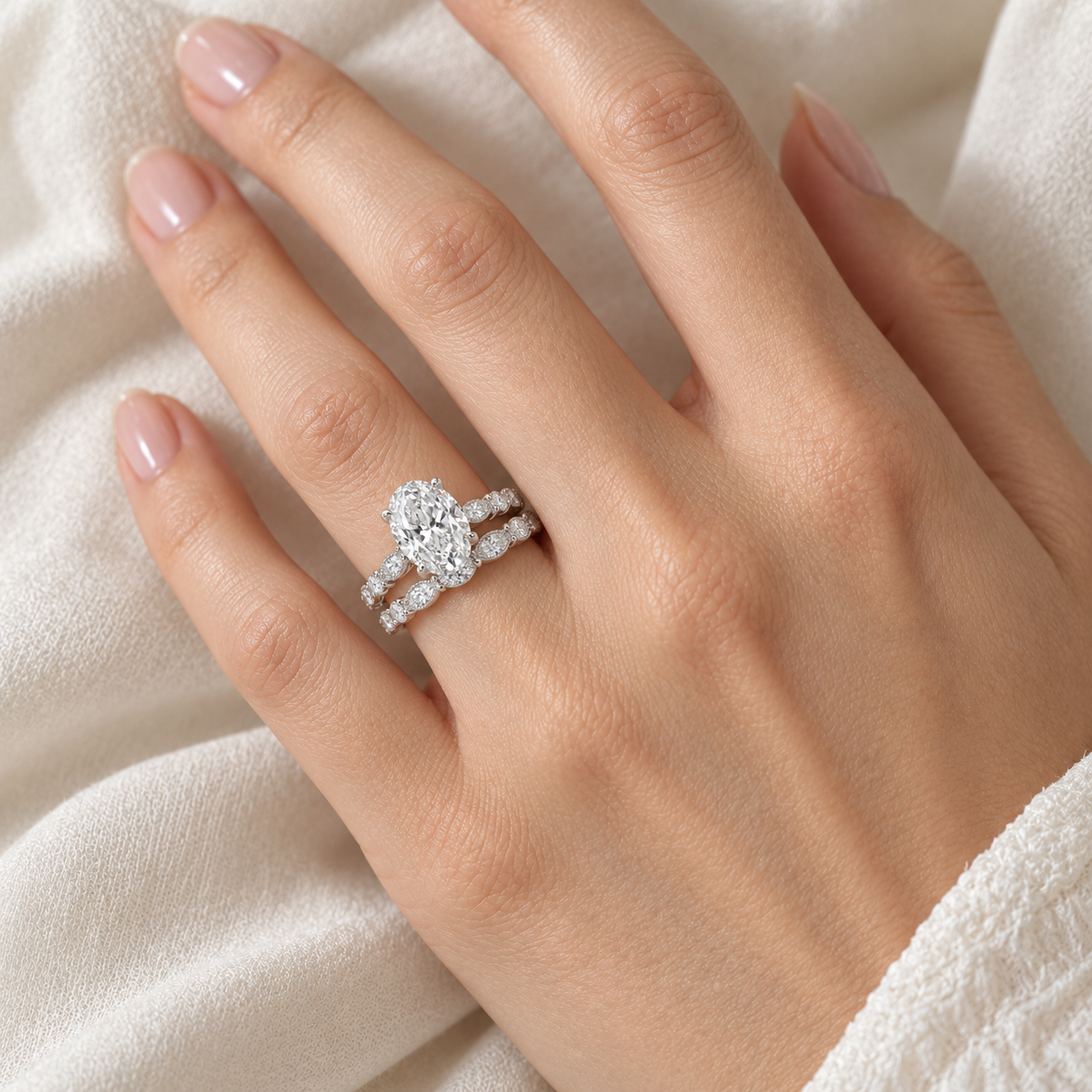 Illustrative render — Oval Lab-Grown Diamond Bridal Set — on-hand view