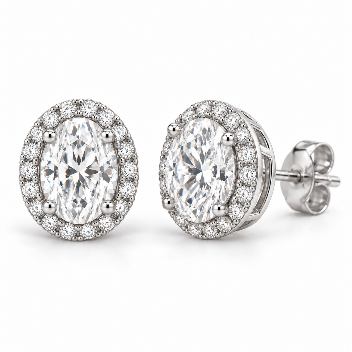Petite Pavé Halo lab diamond studs, Oval, 14K White Gold — front and angled pair view, illustrative design rendering