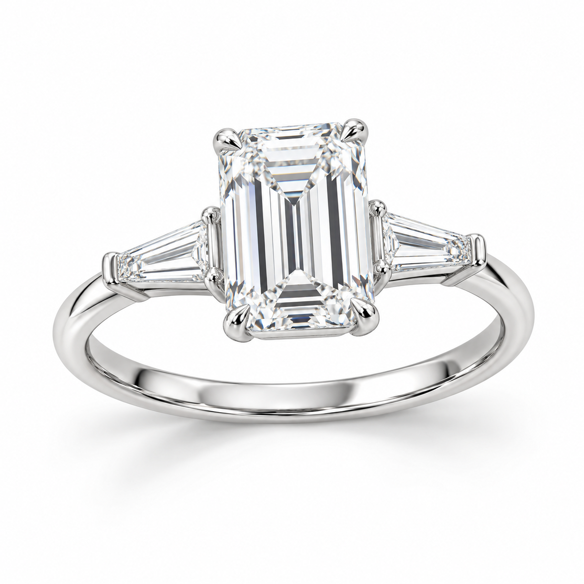 Emerald tapered baguette engagement ring in 14K white gold — illustrative render