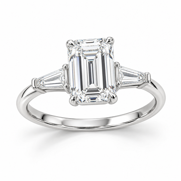Emerald tapered baguette engagement ring in 14K white gold — illustrative render